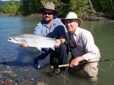 The photo of the week shows pro angling guide Dustin Kovacvich of Nicholas Dean Lodge assisting his guest Gary Baldackin of Toronto, Ontario pose his beautiful Steelhead he landed on the Skeena River on August 16, 2007.  I managed to shoot a video clip of